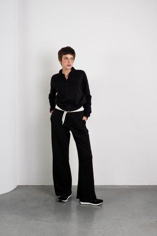 Black tracksuit with a zip-up bomber jacket